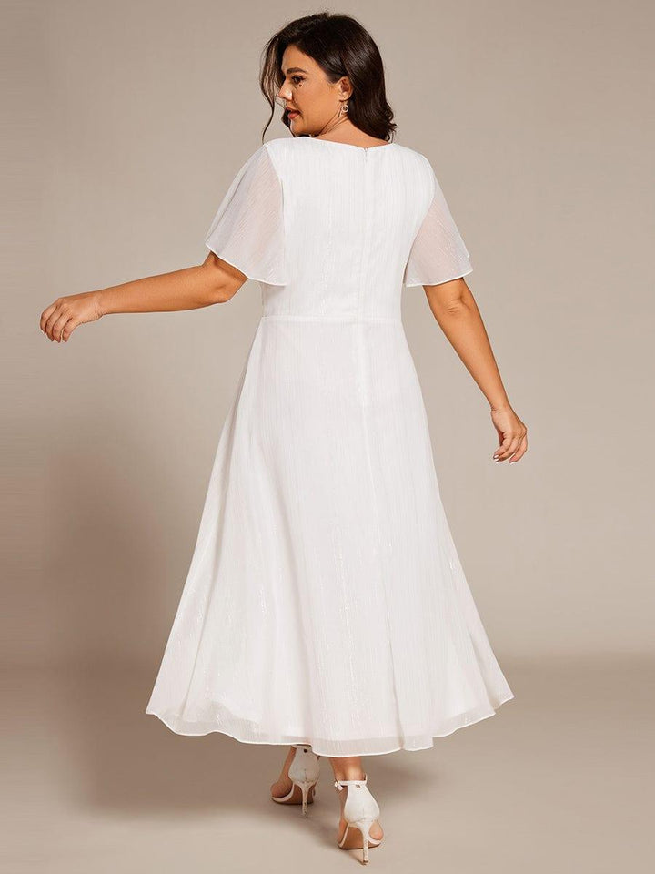 pretty OPAHL|Plus Size Silver Metallic Fabric V-Neck A-Line Wedding Guest Dress featuring Delicate Ruffled Hem